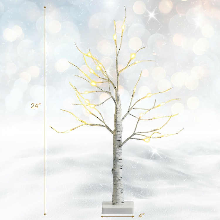 Pre-lit 24" white twig birch tree with bendable branches, ideal for indoor Christmas decoration, battery powered.