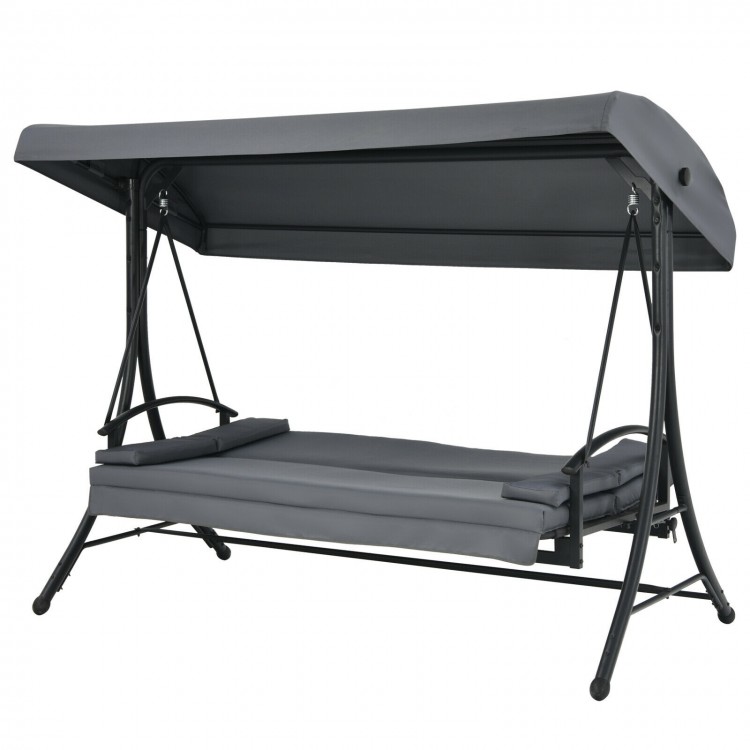 Three-seat patio outdoor swing in gray with adjustable canopy, convertible to flat bed for comfort and relaxation.