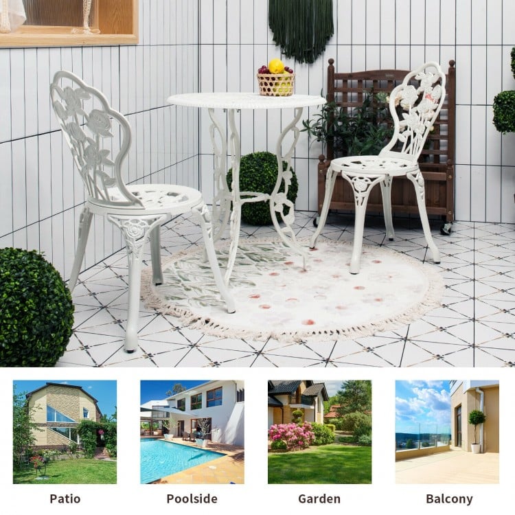 White outdoor cast aluminum patio bistro set with rose design, perfect for garden, balcony, or poolside relaxation.