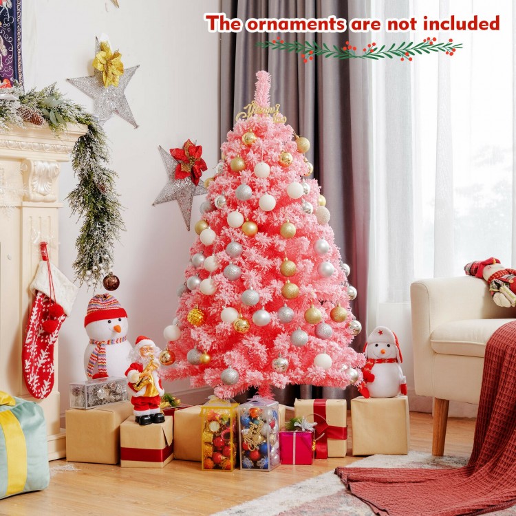 Pink 4.5 ft Christmas tree with snow flocked PVC tips and sturdy metal stand, perfect for festive room decor.
