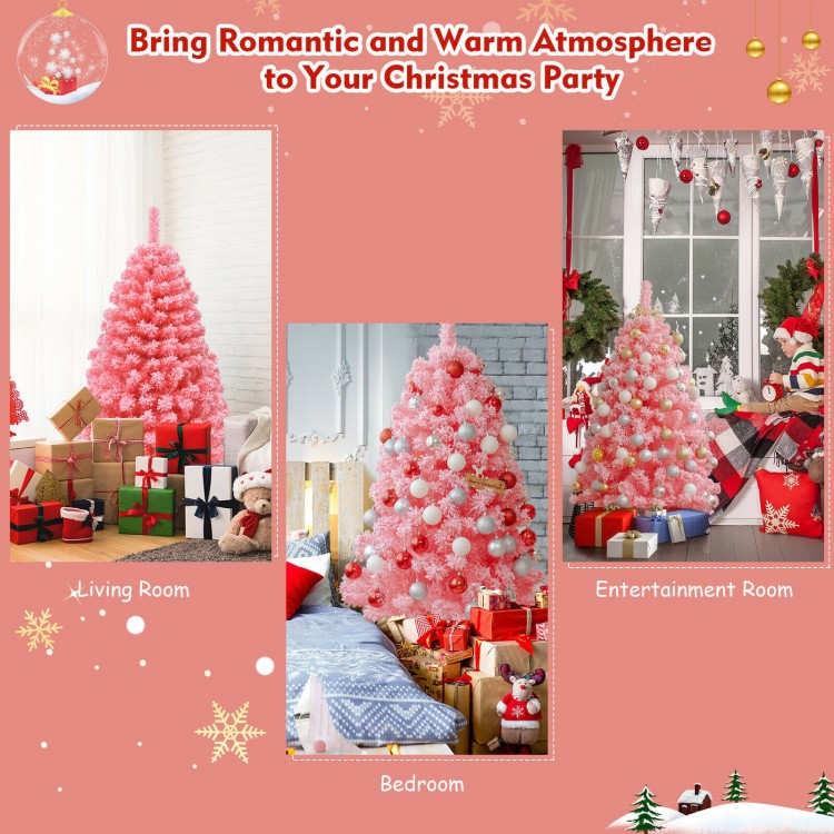 Pink Christmas tree with snow flocked PVC tips, 4.5 ft tall, perfect for creating a warm holiday atmosphere in any room.