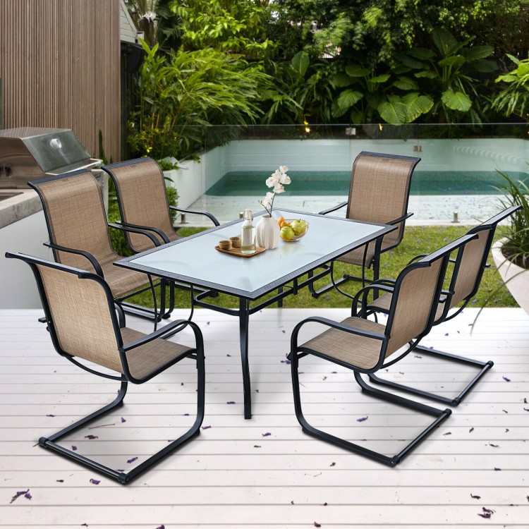 Rectangular 60 x 38 inch patio dining table with weather-resistant steel frame, perfect for outdoor gatherings.