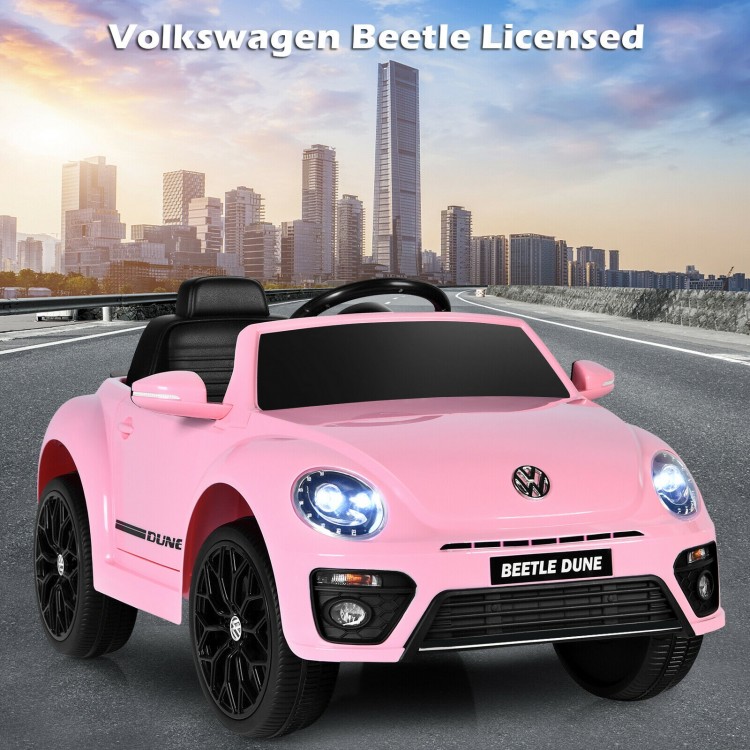 Volkswagen Beetle kids electric ride-on car in pink with remote control, featuring lights, sounds, and spring.