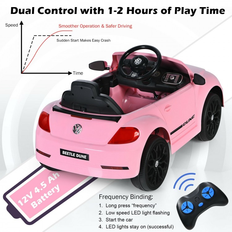 Pink Volkswagen Beetle kids electric ride-on car with remote control, showcasing the battery compartment and charging.