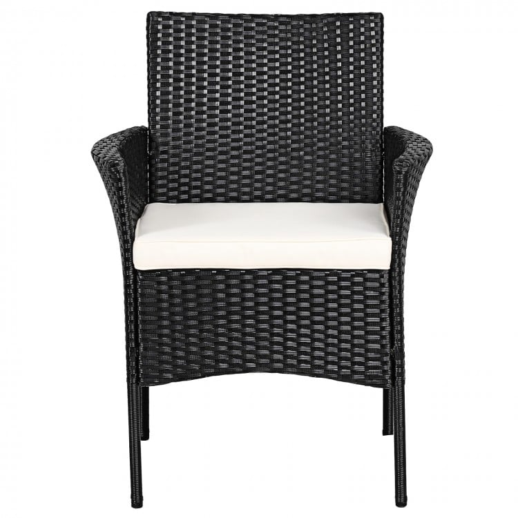 Black patio wicker chair with cozy white seat cushion, featuring a sturdy steel frame and curved armrests for outdoor.