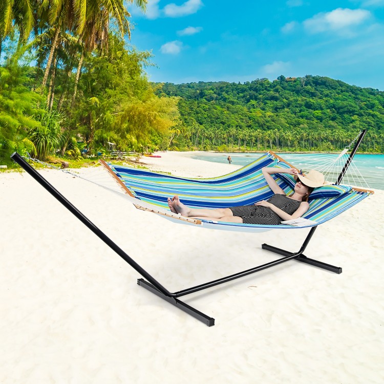 Colorful foldable patio hammock swing chair bed with detachable pillow, perfect for outdoor relaxation on the beach.