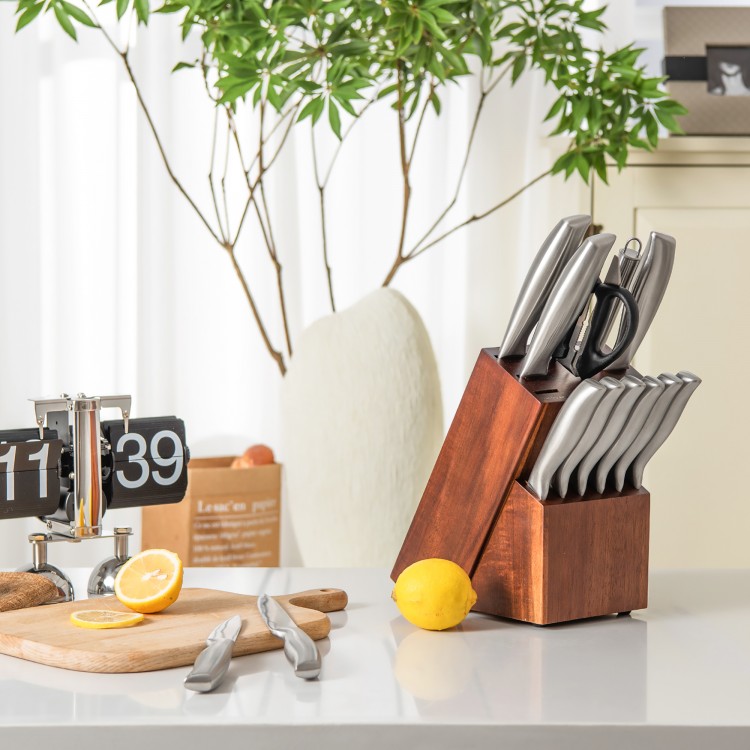 14-piece stainless steel kitchen knife set in a rubber wood block, including chef's, bread, and steak knives.