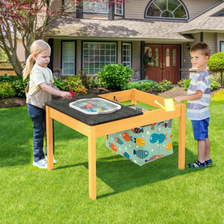 Kids playing with the 3-in-1 sand and water activity table featuring a removable racing tabletop and foldable storage.