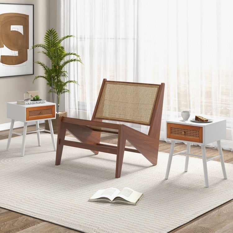 Mid-century modern accent table with a natural rattan drawer, solid wood legs, and spacious tabletop for decor.