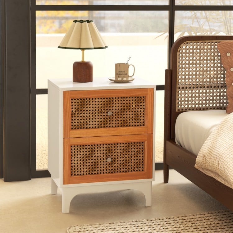 Boho accent table nightstand with two handwoven rattan drawers and solid wood legs, perfect for bedroom storage.