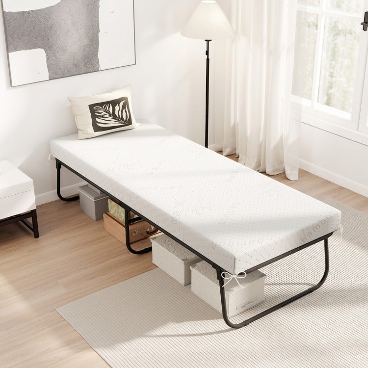 Folding bed with a 75 x 31 inch memory foam mattress, featuring a sturdy metal frame and breathable fabric cover for.