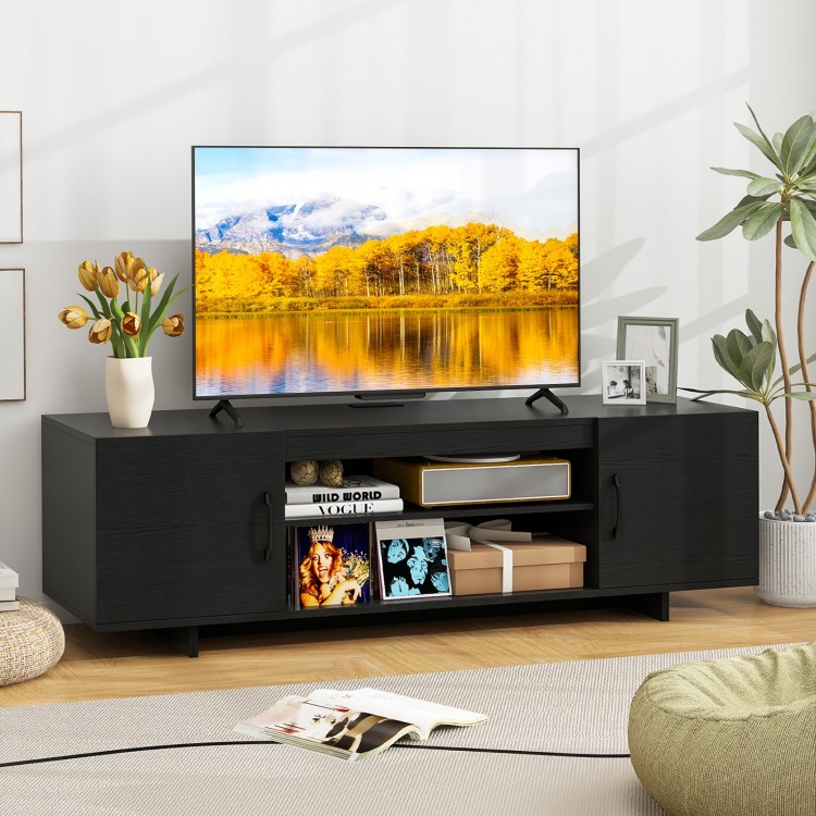 Black TV stand with power outlet, 60" tabletop, and cable management holes, perfect for organizing media supplies.