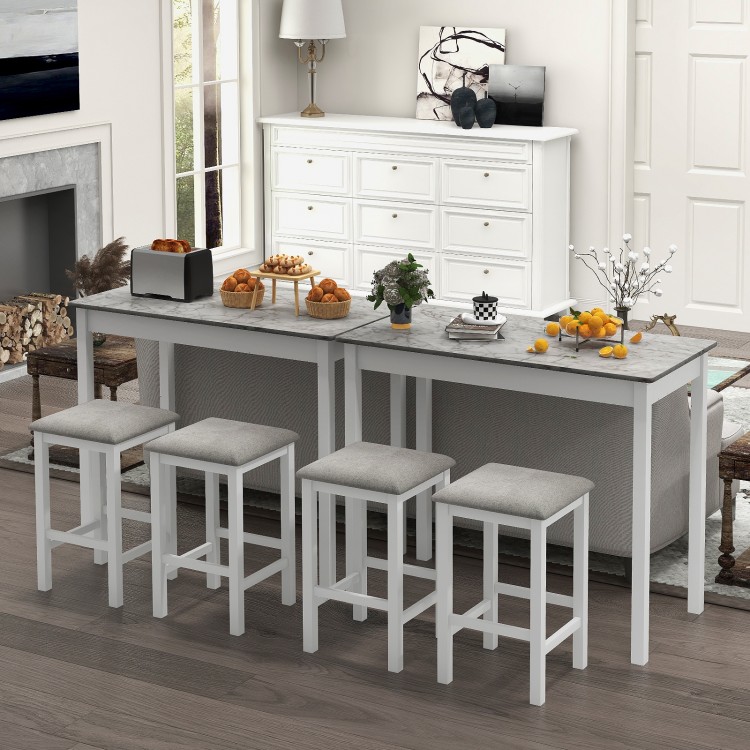 3-piece white bar table set with faux marble top and two padded stools, ideal for dining or breakfast at home.