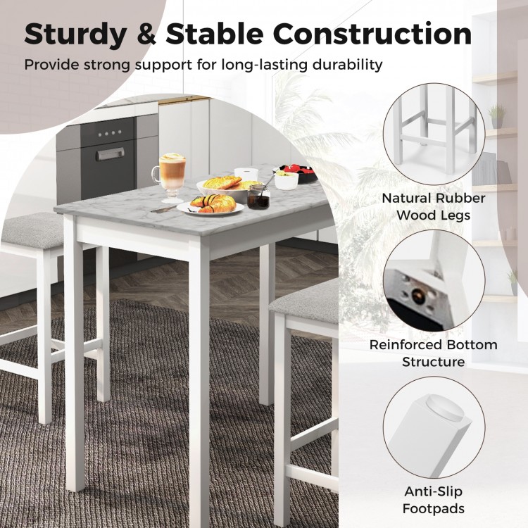 3-piece bar table set featuring a faux marble tabletop and rubber wood legs, perfect for dining or drinks at home.