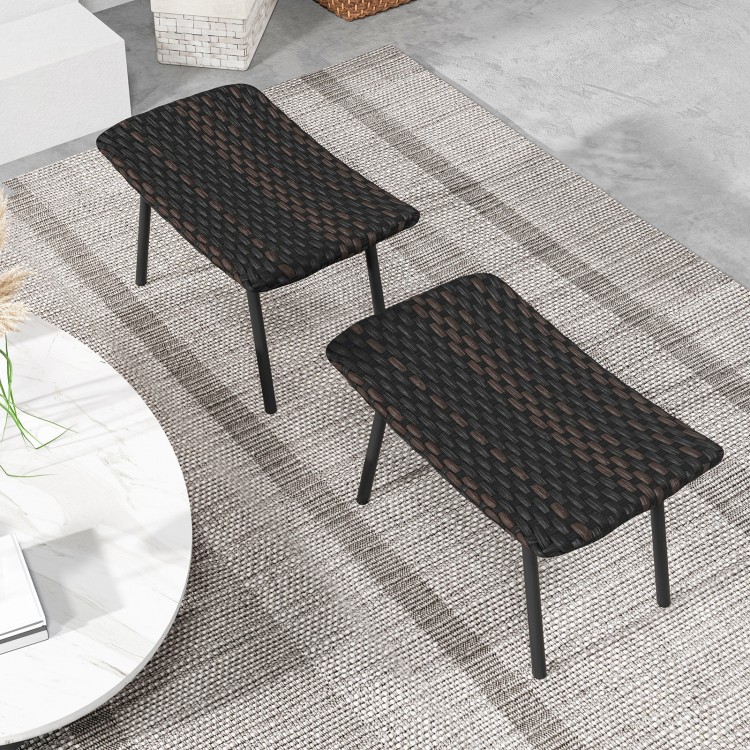 Set of two brown outdoor ottomans with sturdy metal legs, featuring breathable foam for comfort, ideal for patio use.