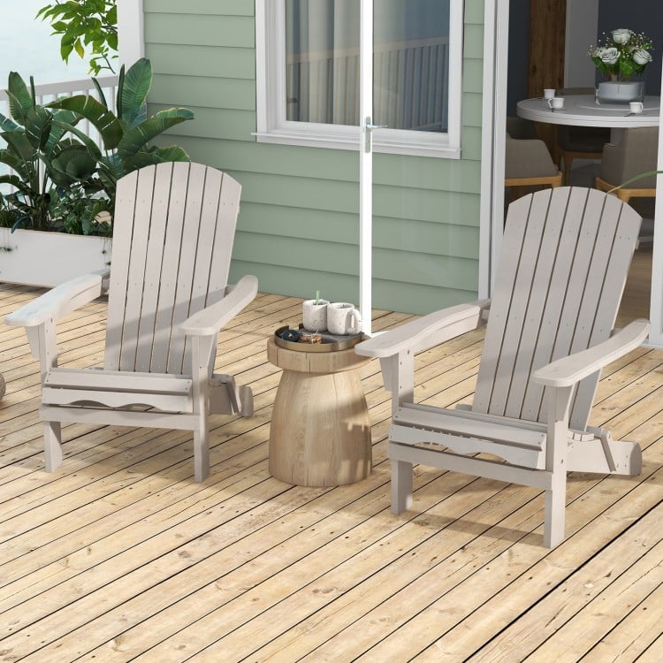 Folding Adirondack chair set of 2 in gray with high backrest and wide armrests, perfect for backyard relaxation.