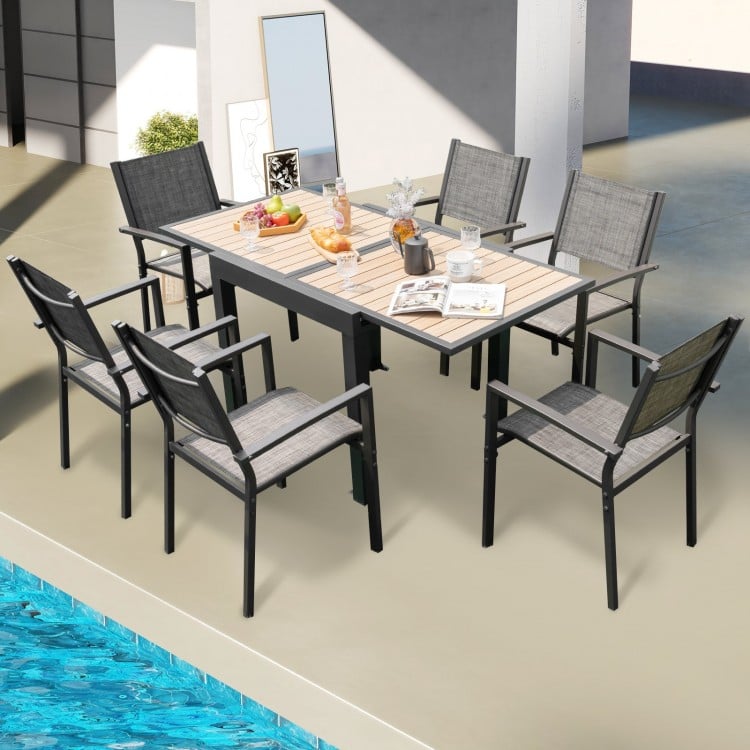 Extendable patio table shown in rectangular shape, accommodating 4-6 people, featuring a wood-like texture and aluminum.