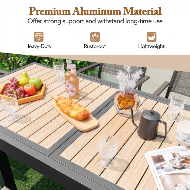 Extendable patio table showcasing a wood-like slatted top, made from rustproof aluminum, accommodating 4-6 people.