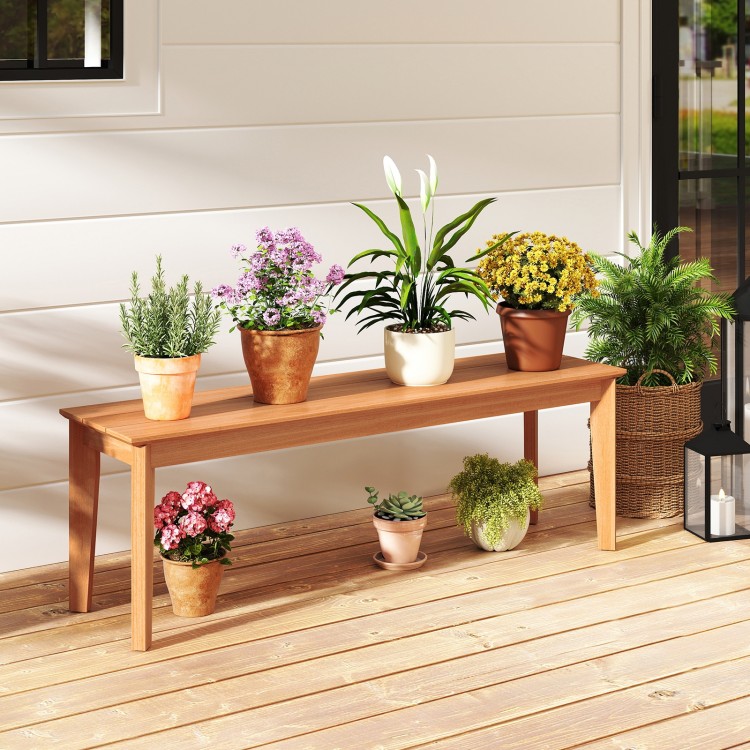 Teak wood outdoor bench with potted plants, featuring a solid construction and 880 lbs weight capacity for patio use.