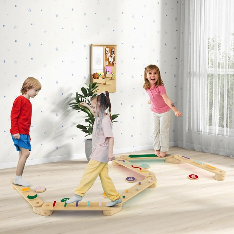 Montessori balance beam set featuring wooden stepping stones, designed for safe play and motor skill development.