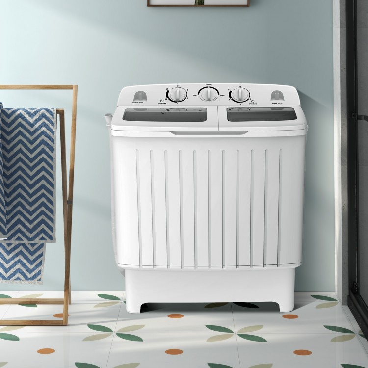 Portable washing machine with twin tub design, 20 lbs capacity, and built-in gravity drain for efficient laundry in.