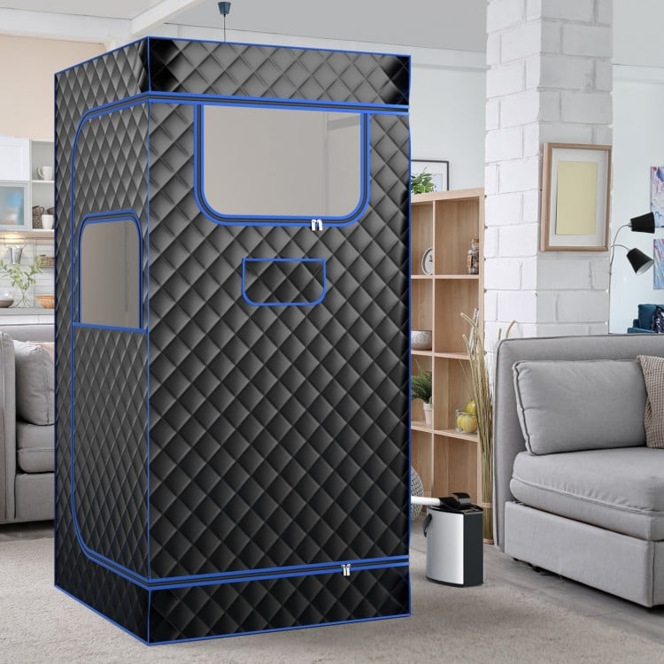 Portable black steam sauna with remote control, 3L generator, and foldable chair for home relaxation and wellness.