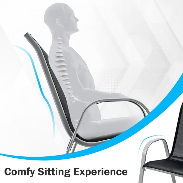Tilted backrest and curved armrests of a stackable chair from the outdoor dining set for comfortable seating.