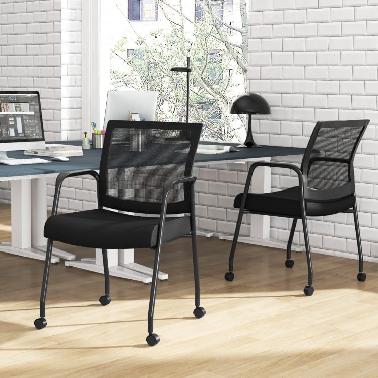 Black office guest chairs on wheels with metal frame and armrests, featuring ergonomic design for comfort and mobility.