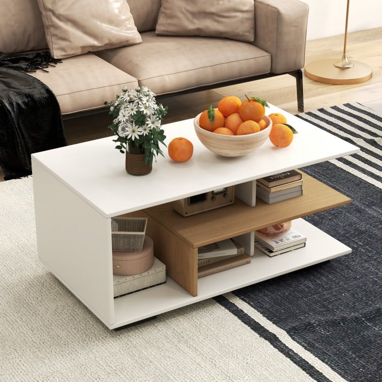 Rectangular coffee table with L-shaped middle shelf in white, featuring ample storage and a geometric design for modern.