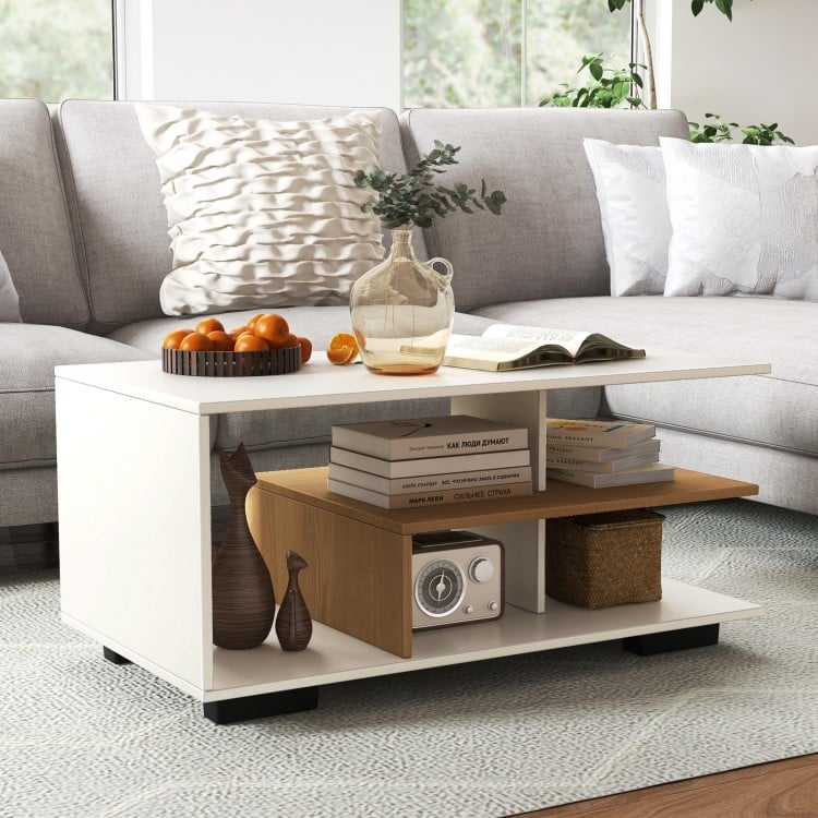 Rectangular coffee table with L-shaped middle shelf in white, featuring ample storage and a geometric design for easy.