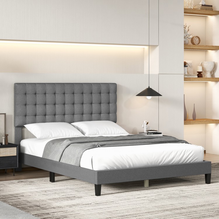 Queen size upholstered platform bed with tufted grey headboard, featuring solid wooden slats for stability and storage.