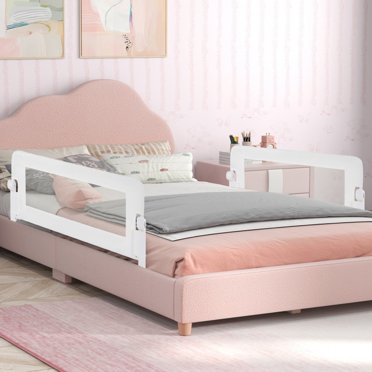 Foldable bed rail in white with soft padding, designed for toddler safety and easy access to the bed.
