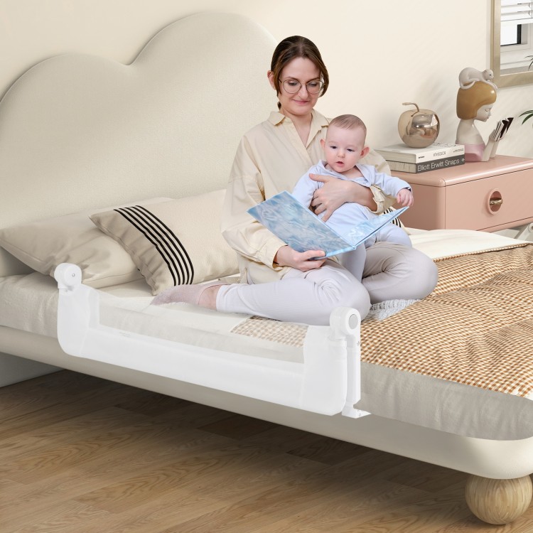 Foldable white bed rail with T-shaped legs and soft padding, providing safety for toddlers during sleep.