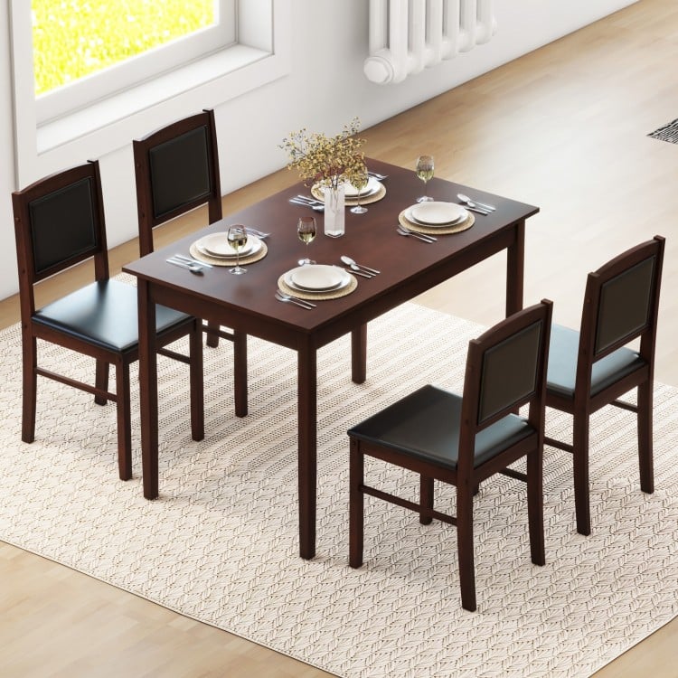 5-piece dining set featuring a brown veneered MDF table and 4 rubber wood chairs with padded seats for small dining.