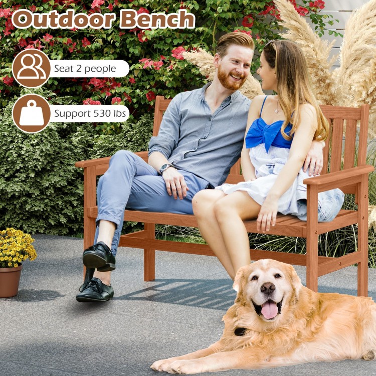 2-person patio loveseat with slatted backrest and armrests, made of solid wood, perfect for outdoor relaxation.