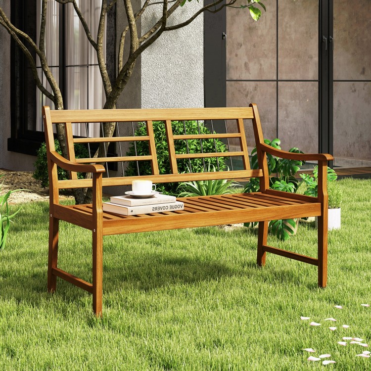 Acacia wood patio bench with curved armrests, slatted seat, and backrest, perfect for garden or backyard relaxation.