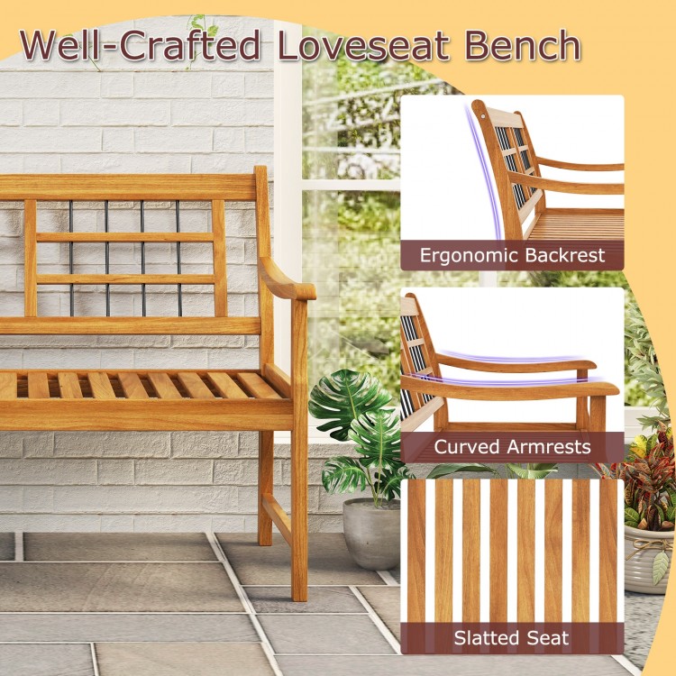 Acacia wood loveseat bench with curved armrests, slatted seat, and ergonomic backrest, ideal for outdoor relaxation.