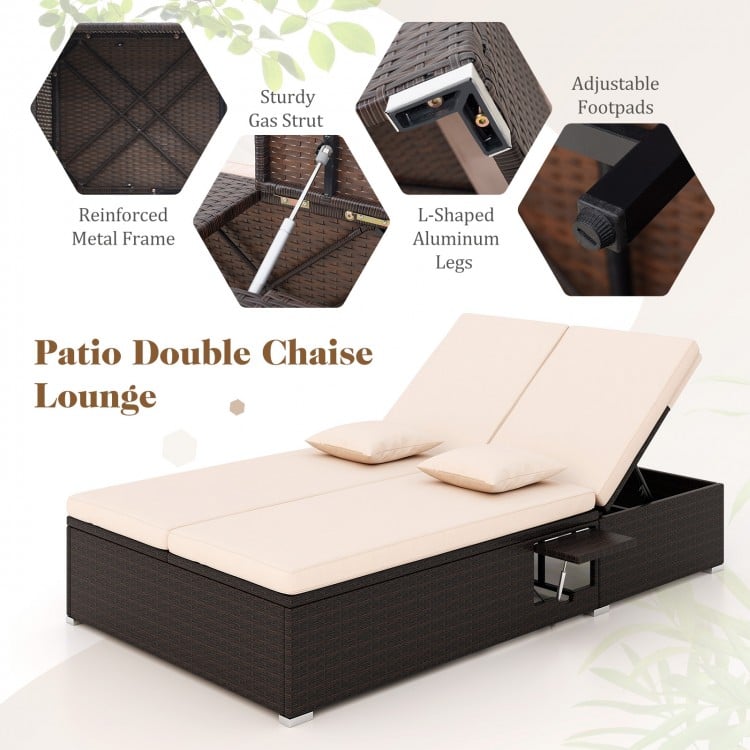 Patio double chaise lounge with beige cushions, adjustable backrests, and folding side trays for outdoor relaxation.