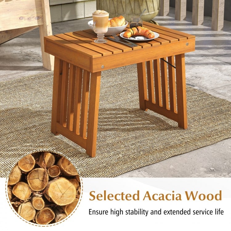 Patio foldable side table made of acacia wood with slatted tabletop, perfect for backyard and poolside use.