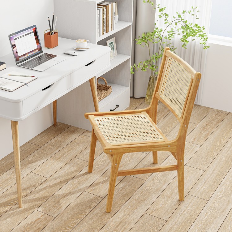 Rattan dining chair with natural cane backrest and teak wood frame, perfect for stylish home office or dining spaces.