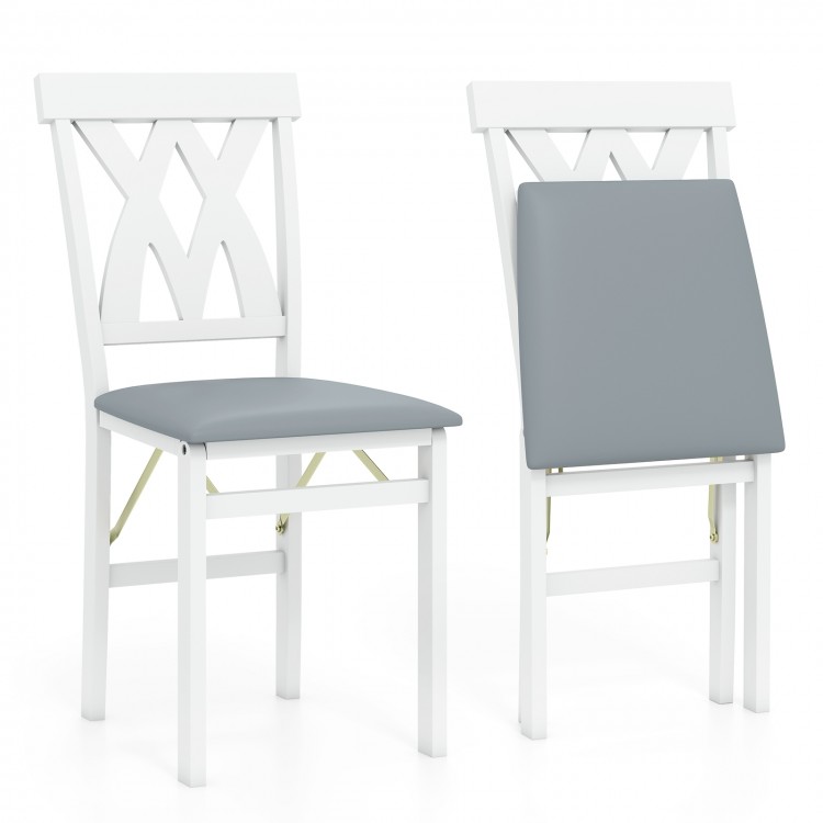 Folding wooden dining chair set of 2 with white frames and gray faux leather upholstery, ideal for small spaces.