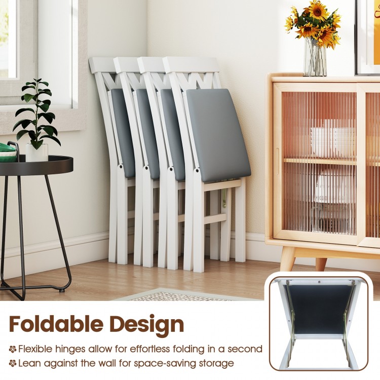 Folding wooden dining chairs set of 2 in white, featuring faux leather upholstery and space-saving design for small.