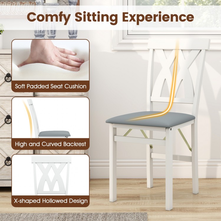 Folding wooden dining chair with soft padded seat, curved backrest, and X-shaped hollowed design for comfort and style.