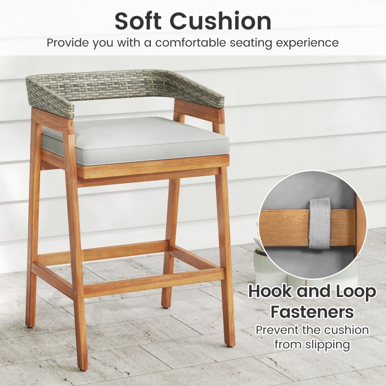 Cushioned barstool from a 5-piece patio set featuring acacia wood and PE rattan, ideal for outdoor gatherings.