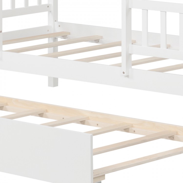 Twin size house bed frame in white with trundle, featuring slats and a decorative roof for imaginative kids' sleeping.