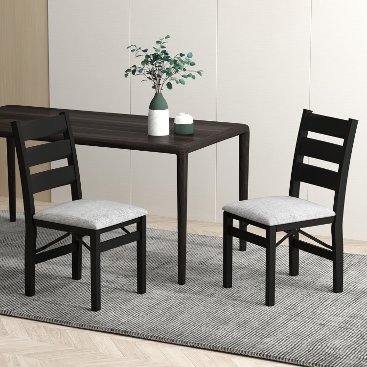 Set of 2 black folding chairs with comfy backrest and cushioned seat, perfect for dining rooms or gatherings.