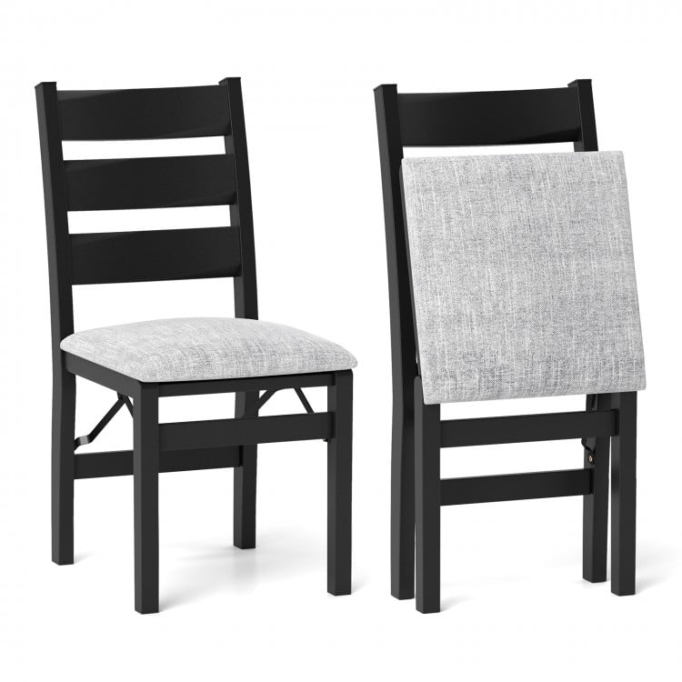 Set of 2 black folding chairs with cushioned seats and ergonomic backrests, perfect for dining and gatherings.