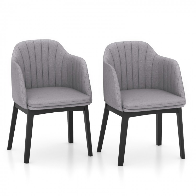 Set of 2 grey upholstered velvet accent dining chairs with curved backrests and sturdy rubber wood frames.