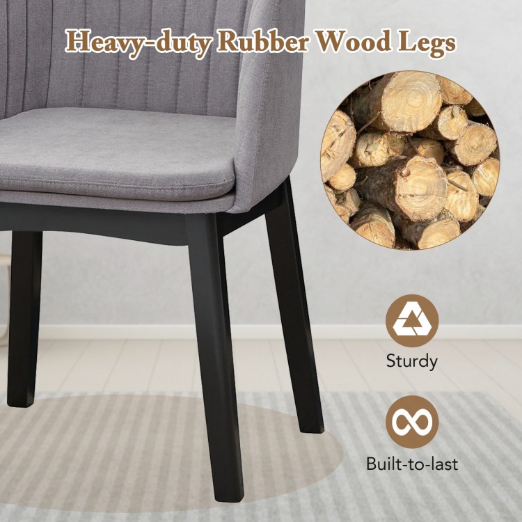 Upholstered velvet dining chair with curved backrest and heavy-duty rubber wood legs, perfect for dining and relaxation.