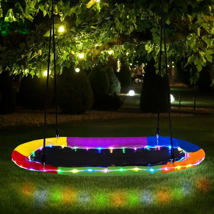 Colorful 60-inch saucer swing with LED lights, sturdy Oxford fabric seat, perfect for nighttime fun in the backyard.